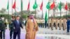 In this photo provided by the Saudi Press Agency, Saudi Crown Prince Mohammed Bin Salman welcomes Chinese President Xi Jinping in Riyadh, Saudi Arabia, Dec. 8, 2022. 