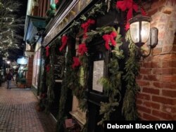 Adorned with evergreens and bright red bows, O'Connell's Restaurant on King Street in the Old Town section of Alexandria, Virginia, is decked out for the holidays.
