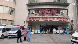 中国艰难应对新冠病毒感染爆发 多个城市医院和殡仪馆承受重负