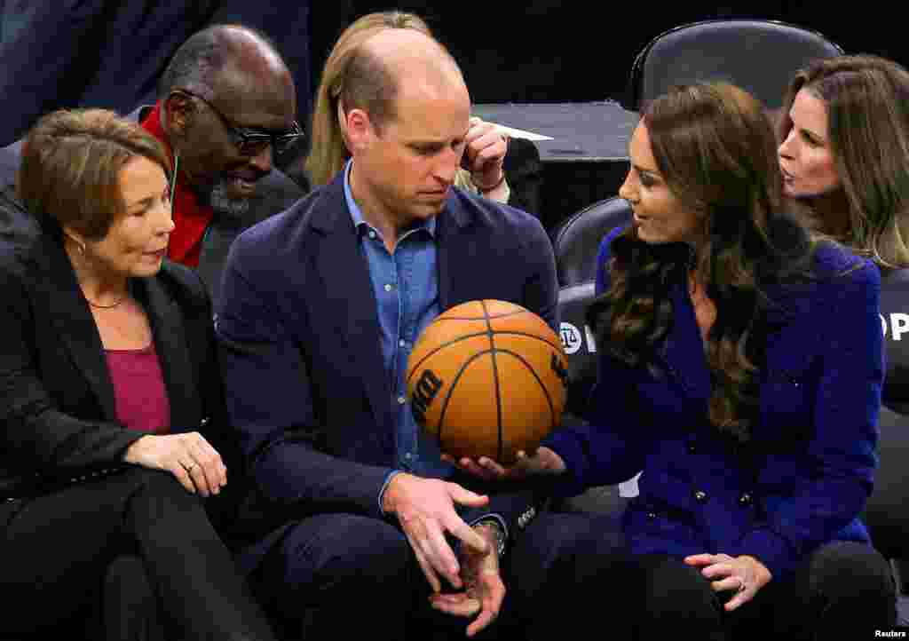 Massachusetts Governor-elect Maura Healey looks on as Britain&#39;s&nbsp;Catherine, Princess of Wales, handed a basketball to Prince William during the Wednesday night National Basketball Association game between the seventeen-time World Champion Boston Celtics and the Miami Heat at TD Garden in downtown Boston, Nov. 30, 2022.