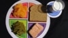 FILE - A sample plate of the food icon MyPlate from the U.S. Department of Agriculture. Few Americans know about the most recent government effort to get people to eat a healthy diet. (AP Photo/Susan Walsh, File)