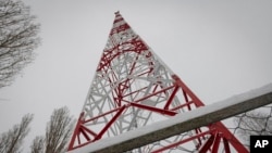 A view of a phone tower of Ukrainian mobile telephone network operator Kyivstar seen in the outskirts of Kyiv, Ukraine, Nov. 30, 2022. 