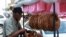 A street vendor arranges 'Kaak' a Lebanese street bread in the southern Lebanese city of Sidon, Sept. 6, 2022. 