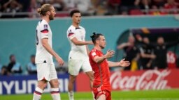 Wales' Gareth Bale reacts after a challenge during the World Cup, group B soccer match between the United States and Wales, at the Ahmad Bin Ali Stadium in in Doha, Qatar, Nov. 21, 2022.