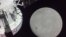 A portion of the far side of the Moon looms large just beyond the Orion spacecraft in this image taken Monday, Nov. 21