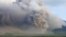 Mount Semeru volcano erupts as seen from Lumajang, East Java province, Indonesia, Dec. 4, 2022. 