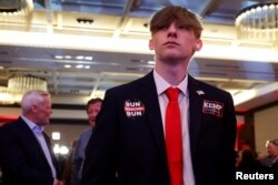 A young voter at an election night party for Georgia Republican candidate for U.S. Senate Herschel Walker at the Omni Hotel in Atlanta, Georgia, November 8, 2022.