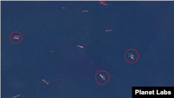 북한 서해 초도 남단 해상을 촬영한 위성사진에 선박 간 환적에 가담한 것으로 보이는 선박 10척(원 안)이 보인다. 사진=Planet Labs