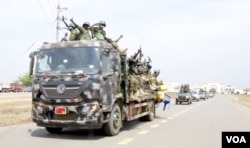 South Sudan soldiers at the Army headquarters in Juma prepare for deployment to the Democratic Republic of Congo, Dec. 28, 2022. (Sheila Ponnie/VOA)