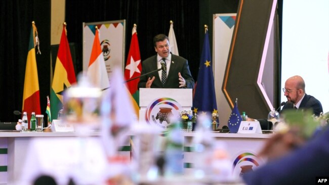 British Armed Forces Minister James Heappey speaks with European Council President Charles Michel to the right during the Accra Initiative summit on West Africa counterterrorism cooperation gathering heads of state and government in Accra, Ghana, on Nov. 22, 2022.