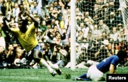 FILE - Brazil's Pele celebrates after scoring the opening goal in the 1970 FIFA World Cup against Italy on June 21, 1970 in Mexico City. (Action Images / Sporting Pictures)