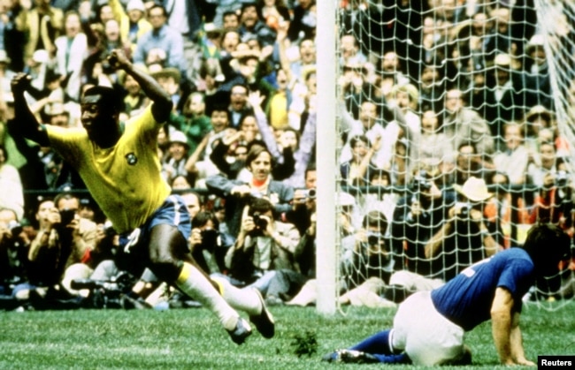 FILE - Brazil's Pele celebrates after scoring the opening goal in the 1970 FIFA World Cup against Italy on June 21, 1970 in Mexico City. (Action Images / Sporting Pictures)