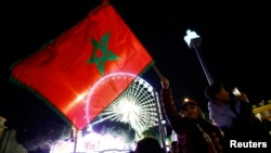 Morocco fans in Nice, France, celebrate after the team's victory over Portugal on Dec. 10, 2022.