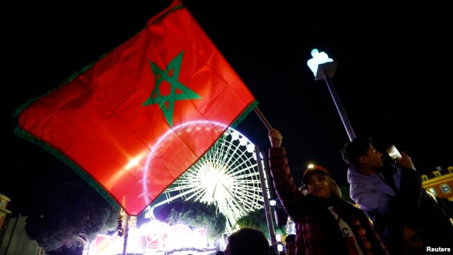 Morocco fans in Nice, France, celebrate after the team's victory over Portugal on Dec. 10, 2022.