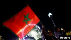 Morocco fans in Nice, France, celebrate after the team's victory over Portugal on Dec. 10, 2022.