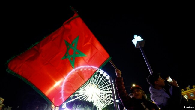 Morocco fans in Nice, France, celebrate after the team's victory over Portugal on Dec. 10, 2022.