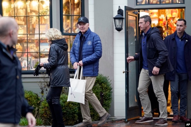 President Joe Biden and first lady Jill Biden leave Nantucket Bookworks in Nantucket, Mass., Friday, Nov. 25, 2022.