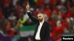 FILE: Al Thumama Stadium, Doha, Qatar - December 10, 2022. Morocco coach Walid Regragui celebrates after the match as Morocco progress to the semi finals