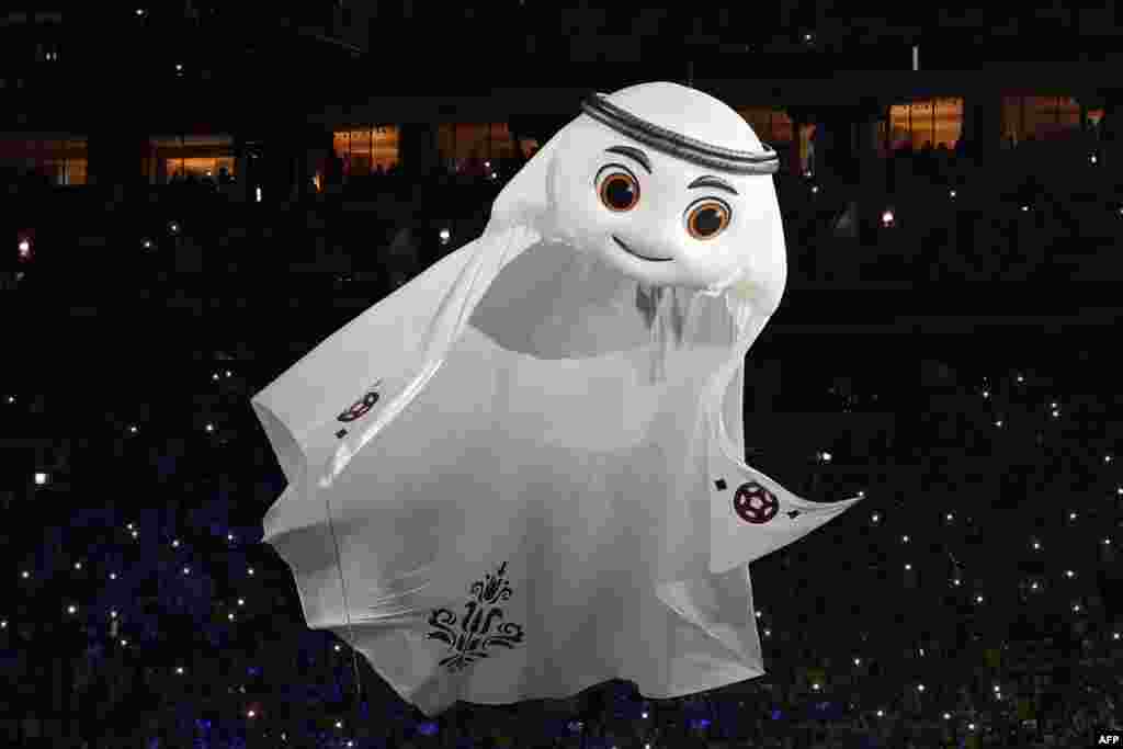 The Qatar 2022 mascot La&#39;eeb performs during the opening ceremony ahead of the Qatar 2022 World Cup.