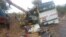 Une vue générale de la scène d'un accident de bus à Kaffrine, dans le centre du Sénégal, le 8 janvier 2023, où au moins 38 personnes sont mortes et des dizaines ont été blessées lors de la collision de deux bus. (Photo de Cheikh Dieng / AFP)