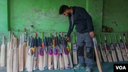 Kashmir produces around 3 million cricket bats annually. The cost of the bats made of Kashmir willow is low in comparison to English willow. (Wasim Nabi/VOA)