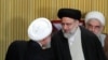 حسن روحانی رئیس دولت پیشین جمهوری اسلامی و ابراهیم رئیسی رئیس دولت فعلی