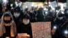 Protesters gather near the Chinese consulate in New York City to show solidarity with their counterparts around the world demonstrating against China's severe anti-virus restrictions, Nov. 29, 2022.