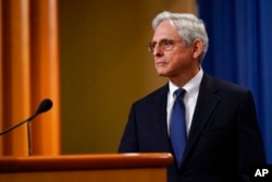 FILE - Attorney General Merrick Garland listens to a question as he leaves the podium after speaking at the Justice Department, Aug. 11, 2022, in Washington.