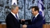 FILE - Israel President Isaac Herzog hands Benjamin Netanyahu the mandate to form a new government, at the President's residency in Jerusalem, Nov. 13, 2022. 
