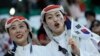 Fans cheer before the World Cup group H soccer match between South Korea and Portugal, at the Education City Stadium in Al Rayyan, Qatar, Dec. 2, 2022. 
