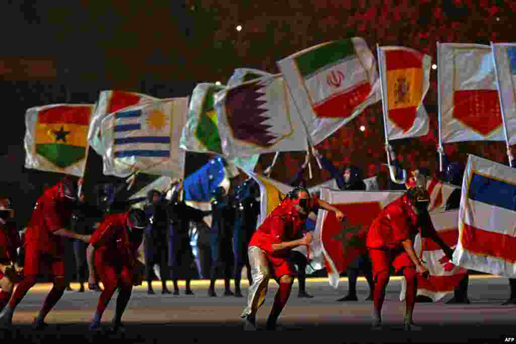 Dancers and the Qatar 2022 mascot La&#39;eeb perform during the opening ceremony ahead of the Qatar 2022 World Cup football match between Qatar and Ecuador.&nbsp;