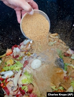 For bokahi composting, food waste is covered with microorganisms, June 11, 2012. (AP Photo/Charles Krupa)