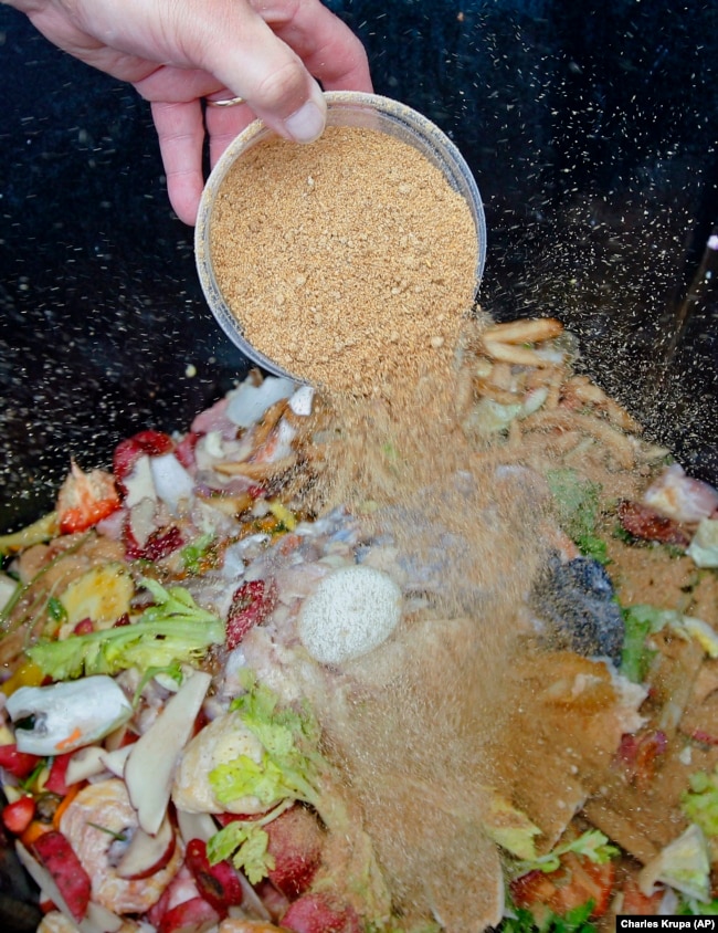 For bokahi composting, food waste is covered with microorganisms, June 11, 2012. (AP Photo/Charles Krupa)