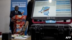 FILE: A new voting machine to be used during the Democratic Republic of the Congo's (DRC) elections sits on a table. Taken Feb. 21, 2018 in Kinshasa. 