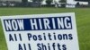 FILE - A sign advertising jobs stands near the SMART Alabama, LLC auto parts plant and Hyundai Motor Co. subsidiary, in Luverne, Alabama, July 14, 2022.