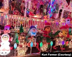 Kurt Farmer’s home in Alexandria, Virginia is covered with lights and holiday decorations for Christmas. During the week the lights are on,1,500 people stop by each night.