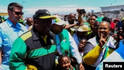 FILE - South African President Cyril Ramaphosa holds meet and greet with Philippi residents on the Cape Flats, a week before the African National Congress holds its national conference in Cape Town, Dec. 10, 2022. 