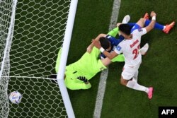 Gol Kristijana Pulišića na meču sa Iranom (Foto: AFP/Kirill Kudryavtsev)