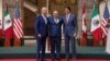 Dari kiri: Presiden AS Joe Biden, Presiden Meksiko Andres Manuel Lopez Obrador dan PM Kanada Justin Trudeau sebelum konferensi pers bersama pada akhir KTT Amerika Utara di Mexico City, Meksiko, Selasa 10 Januari 2023.