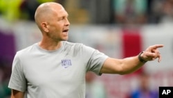 Head coach Gregg Berhalter of the United States follows the game during the World Cup Group B soccer match between England and the United States, at the Al Bayt Stadium in Al Khor, Qatar, Nov. 25, 2022.