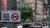 FILE - A sign reading "Gun Free Zone" is posted near around Times Square, Aug. 31, 2022, in New York. 