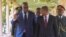 FILE - President of Democratic Republic of the Congo Felix Tshisekedi (L) gestures as he walks with President of Angola Joao Lourenco during his first visit in Luanda, Angola, Feb. 5, 2019.