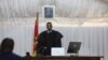 Judge Efigenio Baptista stands at the Maputo Central Prison on Dec. 7, 2022 while reading the sentence for Ndambi Guebuza, son of the former president of Mozambique Armando Guebuza, and others accused in the trial for a vast corruption scandal.