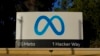FILE - Meta's logo can be seen on a sign at the company's headquarters in Menlo Park, Calif., on Nov. 9, 2022.