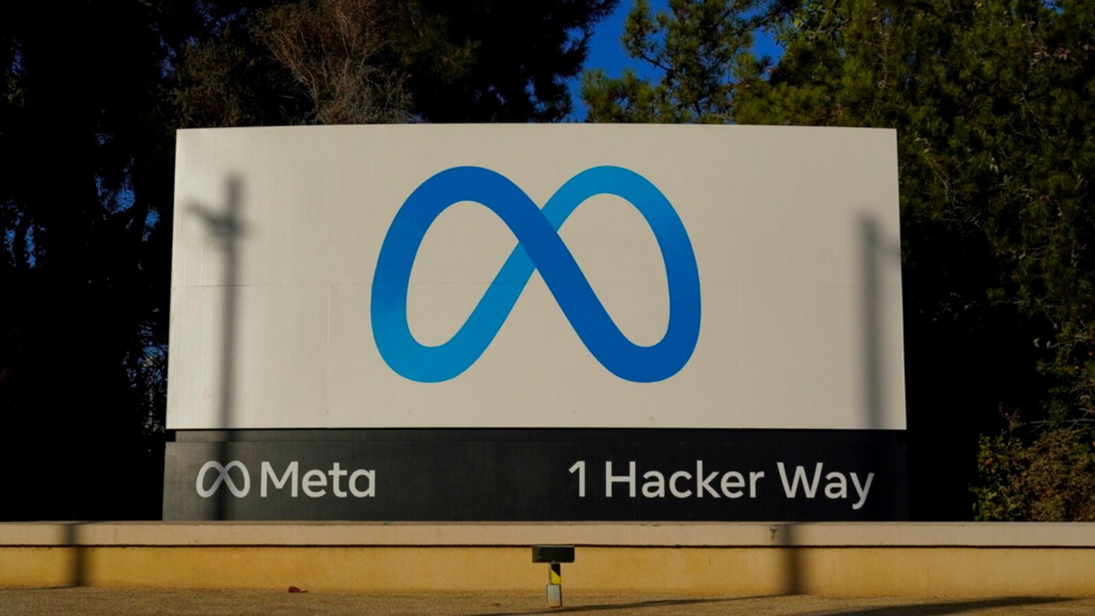 FILE - Meta's logo can be seen on a sign at the company's headquarters in Menlo Park, Calif., on Nov. 9, 2022.