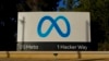 FILE - Meta's logo can be seen on a sign at the company's headquarters in Menlo Park, California, Nov. 9, 2022.