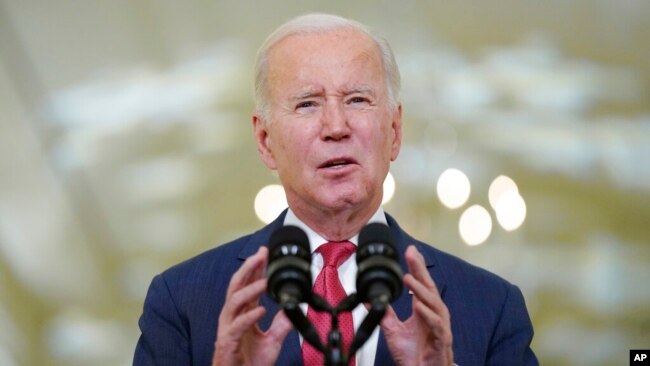 US President Joe Biden speaks in the East Room of the White House, Dec. 22, 2022, in Washington.