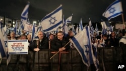 Protesters flock to the streets in Tel Aviv, Israel, Jan. 14, 2023.