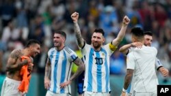 Argentina's Lionel Messi celebrates defeating Croatia 3-0 in a World Cup semifinal soccer match at the Lusail Stadium in Lusail, Qatar, Dec. 13, 2022.