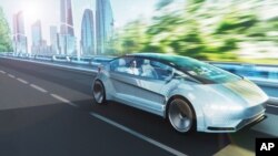 夏普公司的支持安全与注重环境“高级自动驾驶仪”被认为是未来新一代具有环保意识的自动驾驶演进装置。Business Wire照片，美联社提供。2022年12月14日。